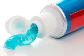 Toothpaste is used to promote oral hygiene: it is an abrasive that aids in removing dental plaque and food from the teeth, assists in suppressing halitosis