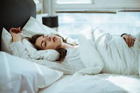 Symptoms of insomnia include finding it hard to fall asleep, waking up several times during the night and feeling tired during the day.